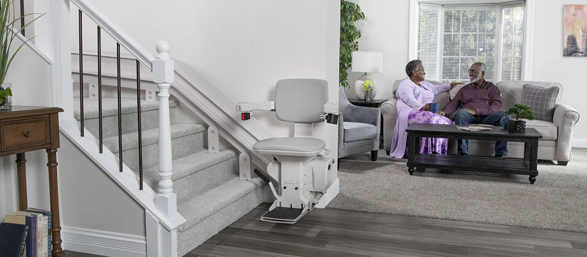 Bruno Elite curved stairlift custom-fitted to a curved staircase